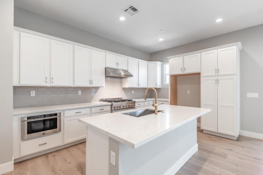 Well-equipped kitchen with ample countertop and cabinet space