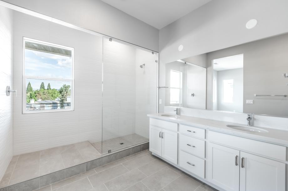 Spa-like primary bathroom with a beautiful walk-in shower