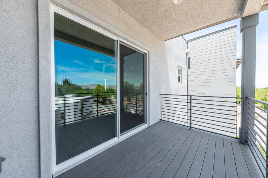 Covered deck located off the primary bedroom suite
