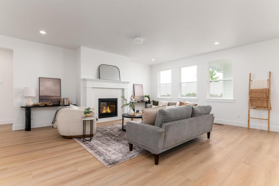 Cozy and inviting great room with tile surround fireplace