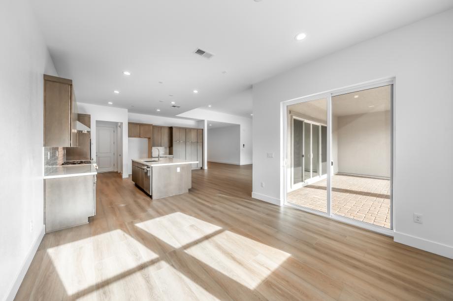 Casual dining area adjacent to kitchen and access to covered patio