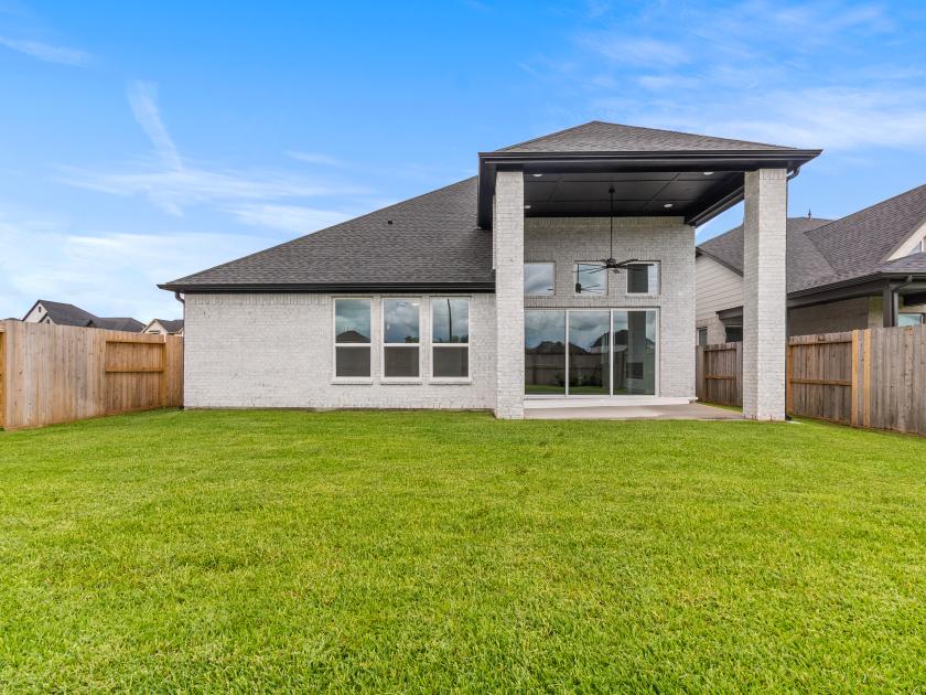 Spacious backyard ideal for outdoor living, dining, and entertaining