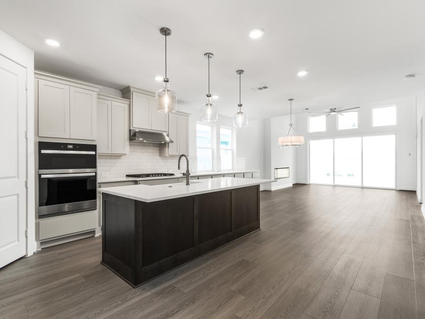 Well-equipped kitchen with beautiful cabinets and ample countertop space