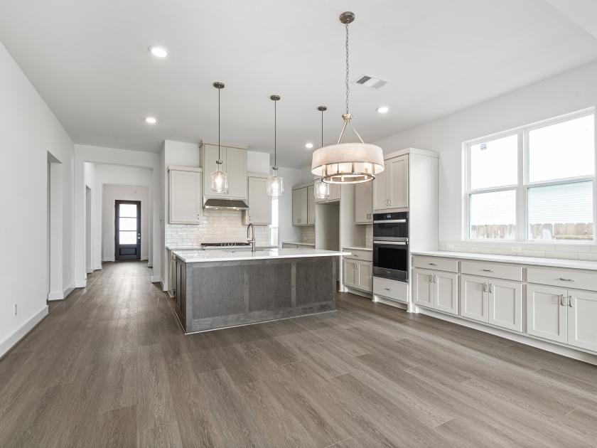 Well-equipped kitchen with beautiful cabinets and ample countertop space