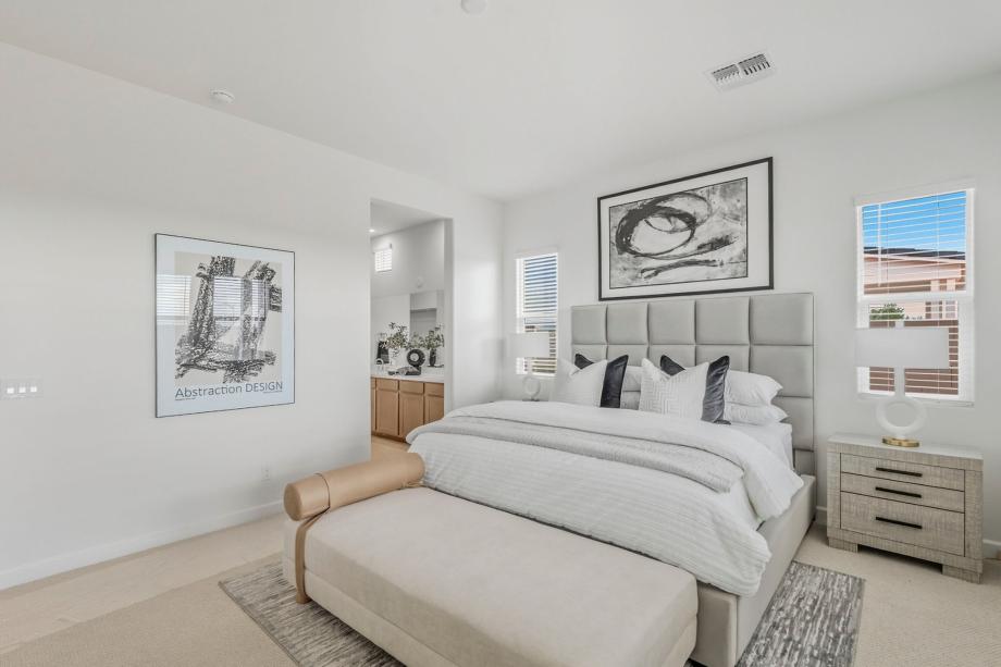 Expansive primary bedroom with luxurious finishes