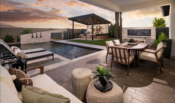 Beautiful resort-style backyard with pool and outdoor kitchen