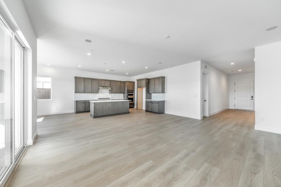 Sliding glass door providing ample natural light on the open-concept floor plan