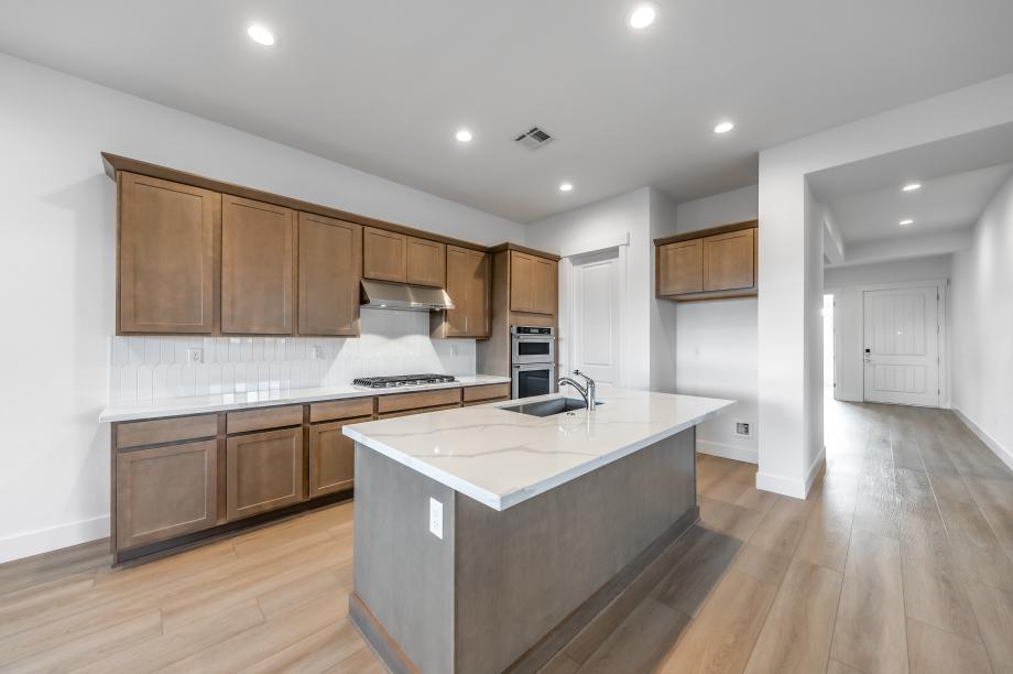 Well-equipped kitchen with beautiful cabinets and ample countertop space