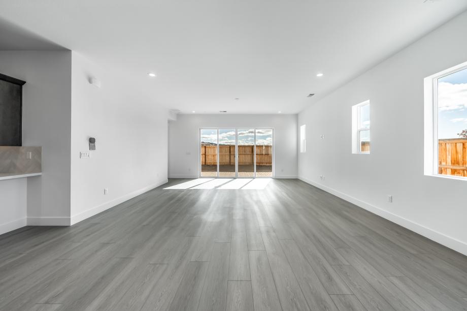 Split sliding glass door connecting indoor-outdoor living