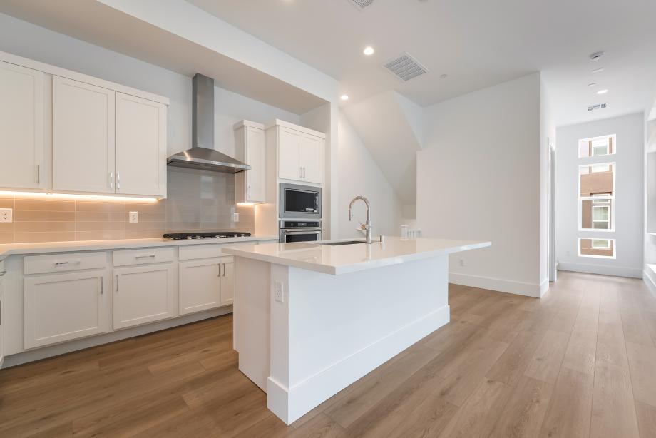 Beautifully upgraded kitchen with custom backsplash