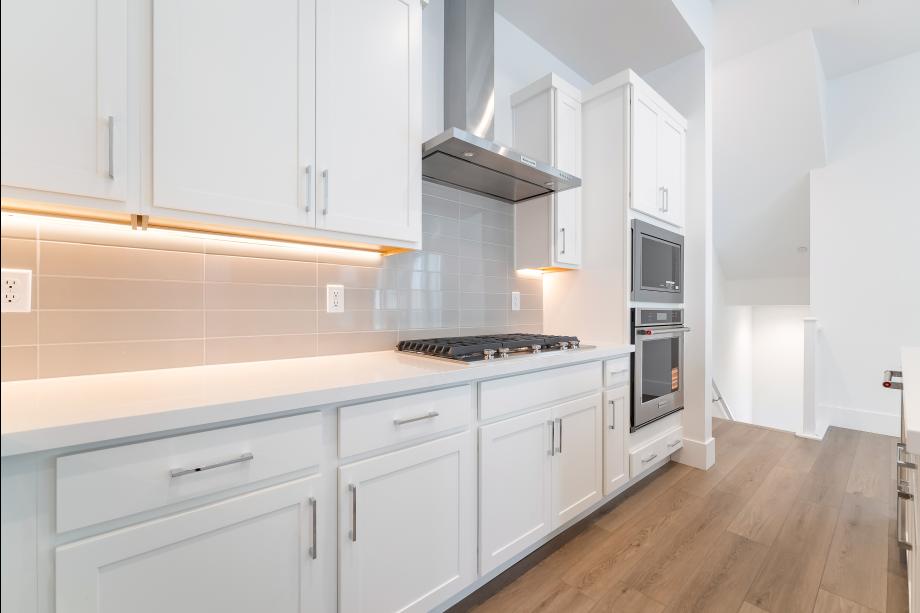 Stainless kitchen appliances and hood