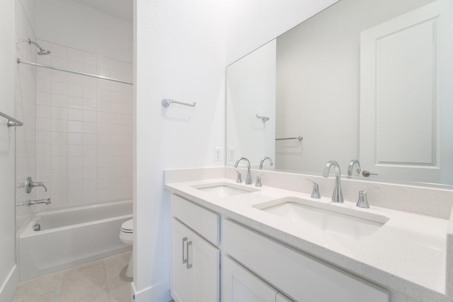 Secondary bath with dual vanities