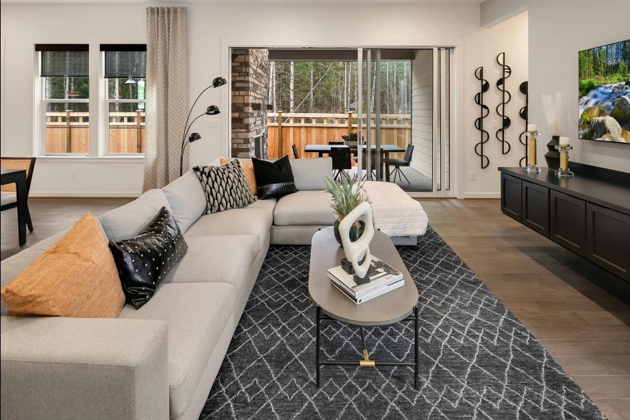 Stacking glass doors open from the great room to covered patio