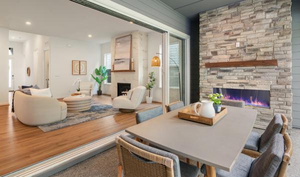 Seamless indoor-outdoor living through expansive multi-panel stacking doors