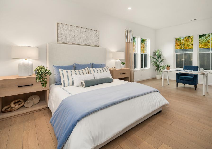 Large primary suite with an extended sitting area