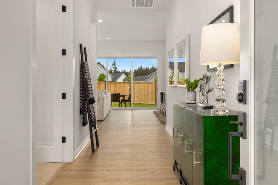 Bright foyer with 10' ceilings draws you into the home
