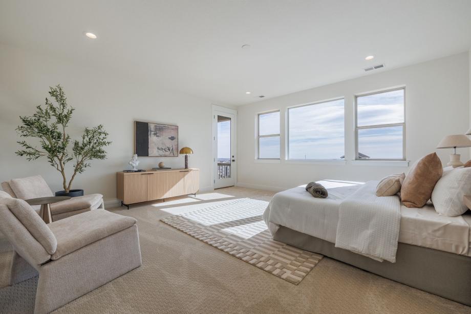 Relax in your primary bedroom with balcony access