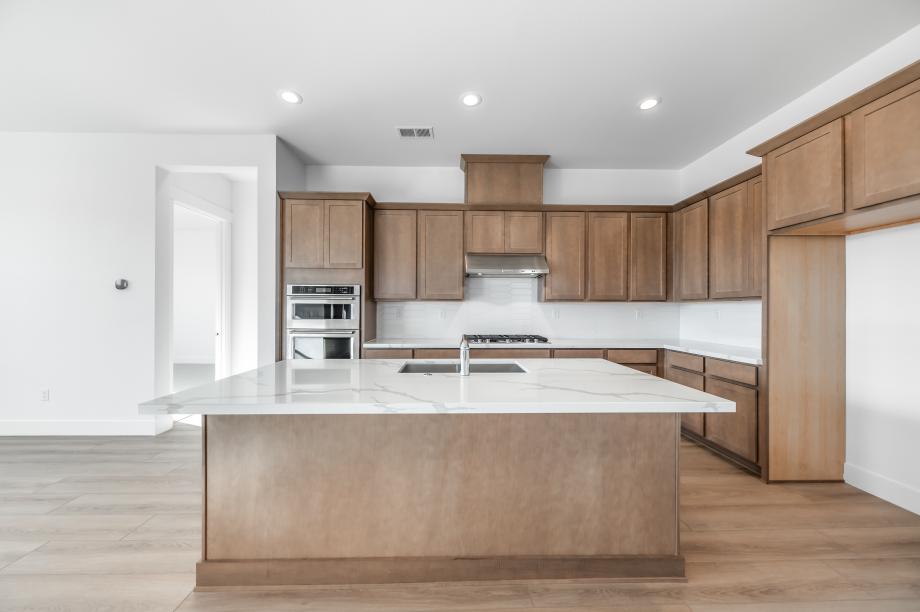 Well-equipped kitchen with beautiful cabinets and ample countertop space