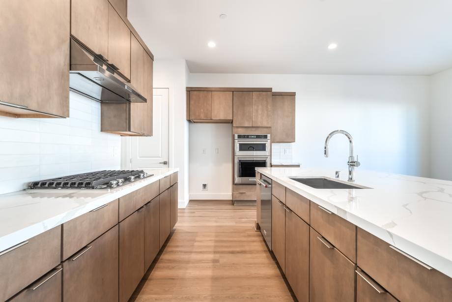Upgraded hard surface and subway tile backsplash