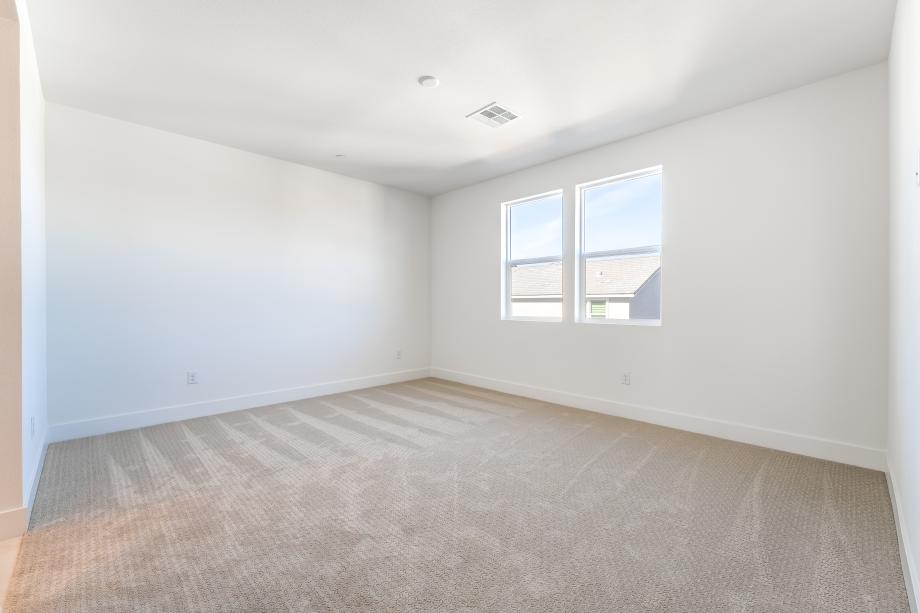 Expansive primary bedroom