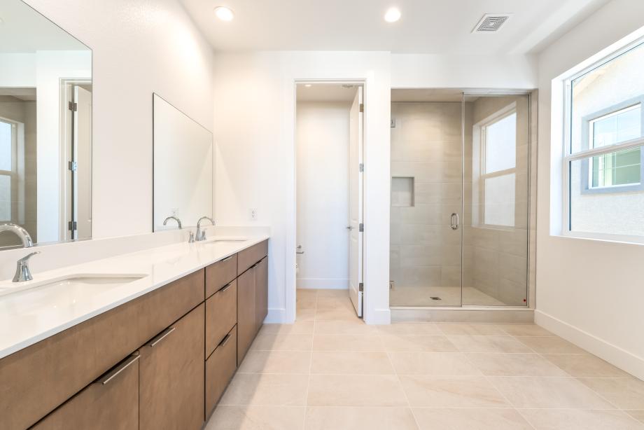 Primary bath features dual vanities