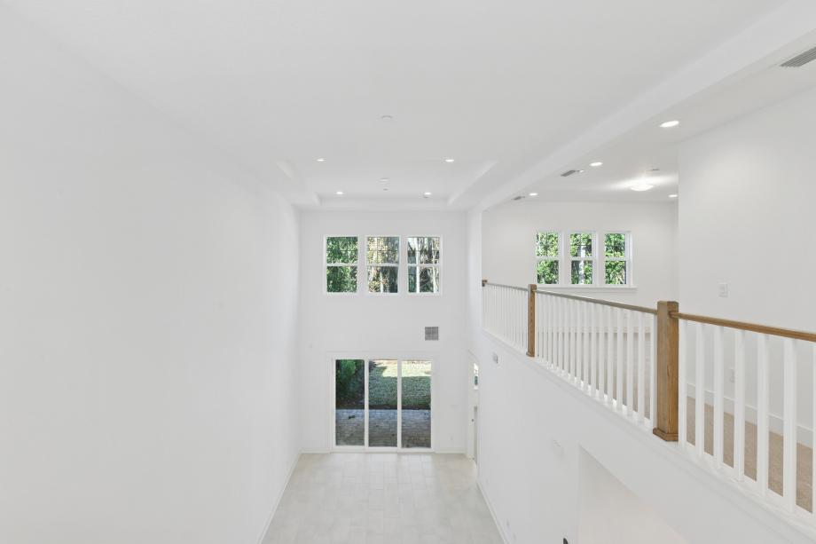 Beautiful tall ceilings and windows in an open-concept floor plan