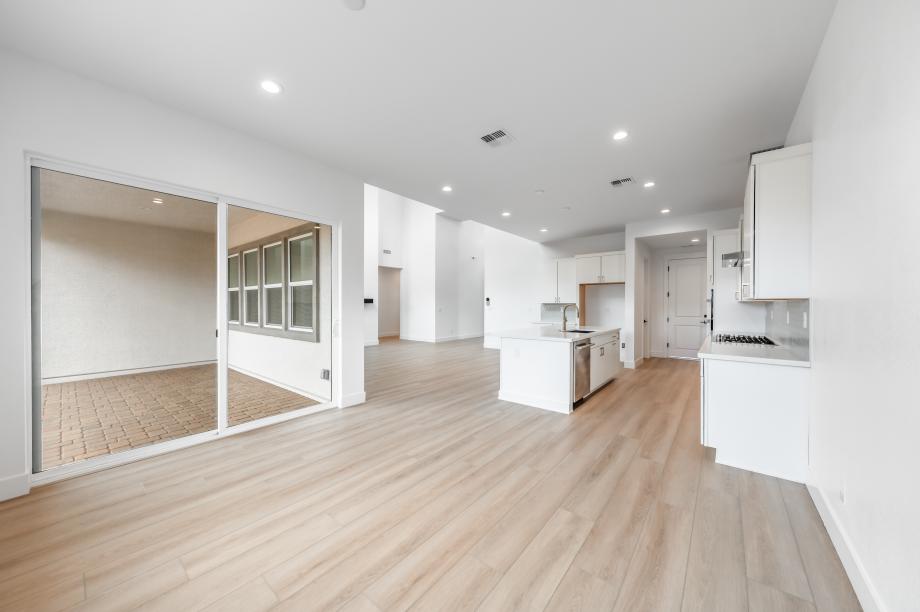 Casual dining area adjacent to kitchen and access to covered patio