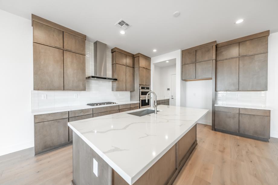 Well-equipped kitchen with beautiful cabinets and ample countertop space