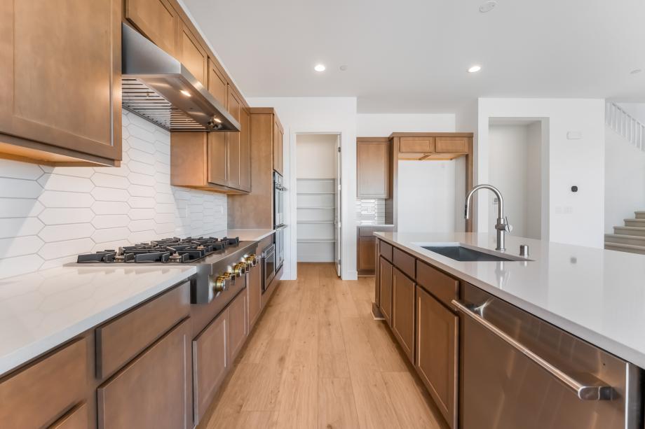 Upgraded kitchen hard surface and tile backsplash
