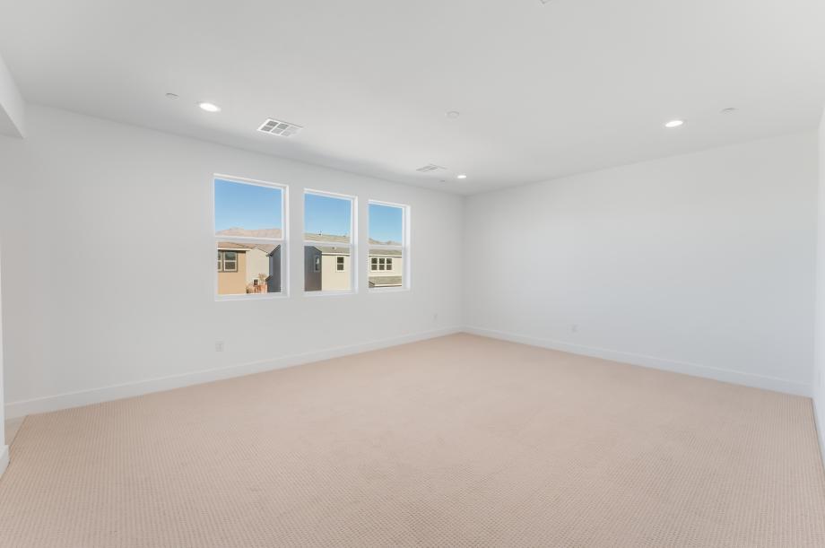 Impressive primary bedroom suite