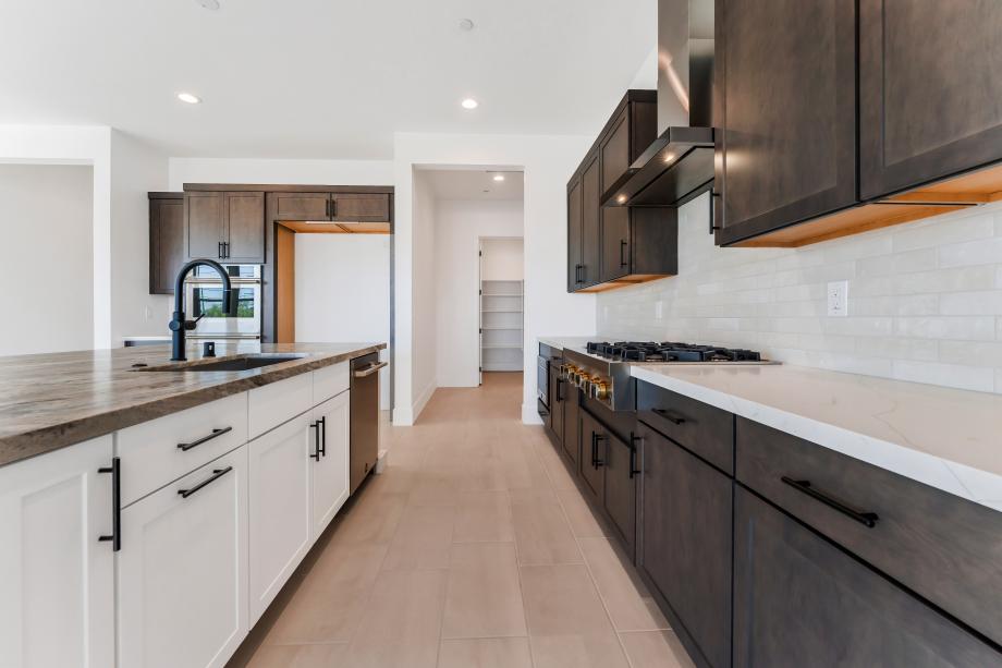 Upgraded kitchen hard surface and tile backsplash