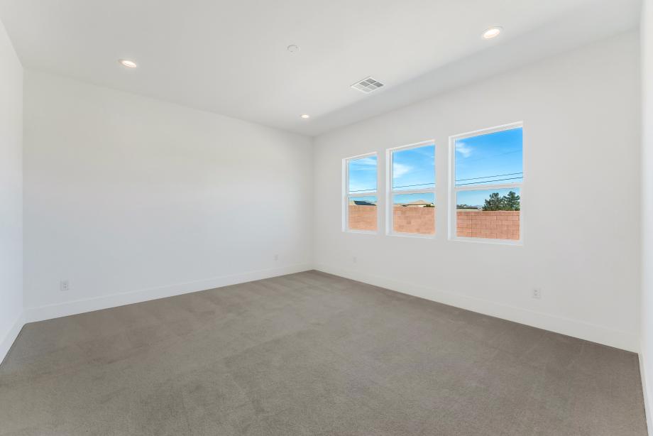 Expansive primary bedroom suite