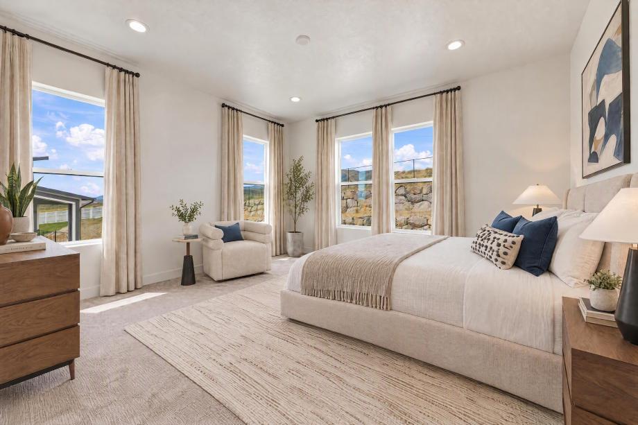 Primary bedroom with private hillside views
