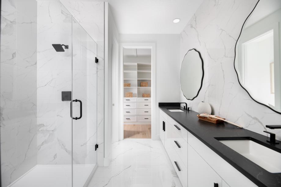 Spa-like primary bathroom retreat with walk-in closet
