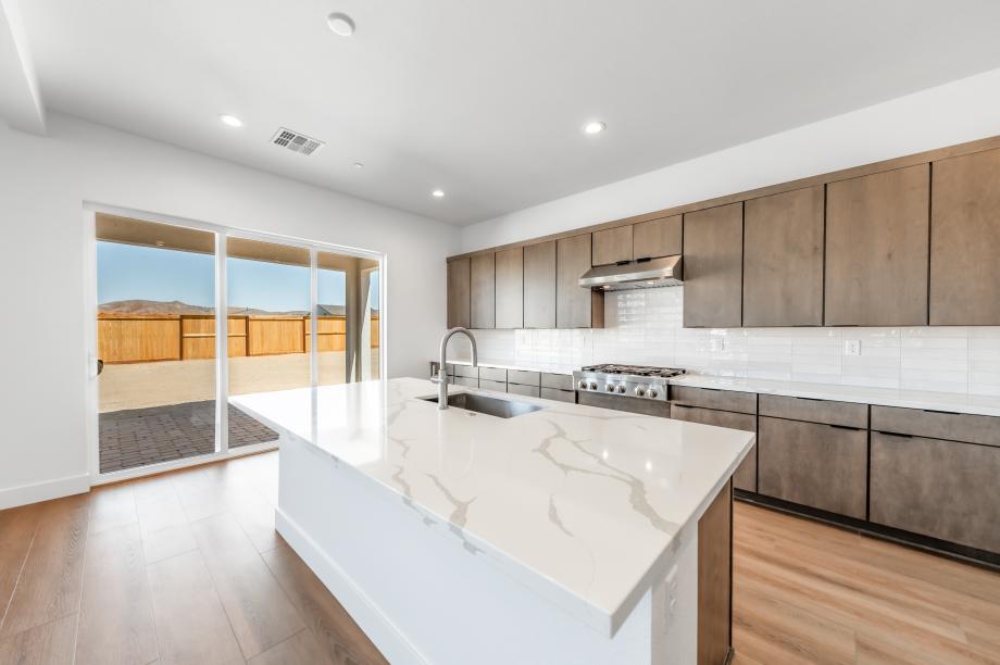 Beautiful kitchen with a large center island and sliding glass door