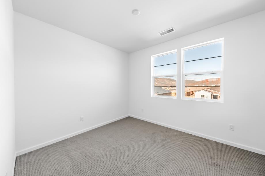 Secondary bedroom suite with ample natural light