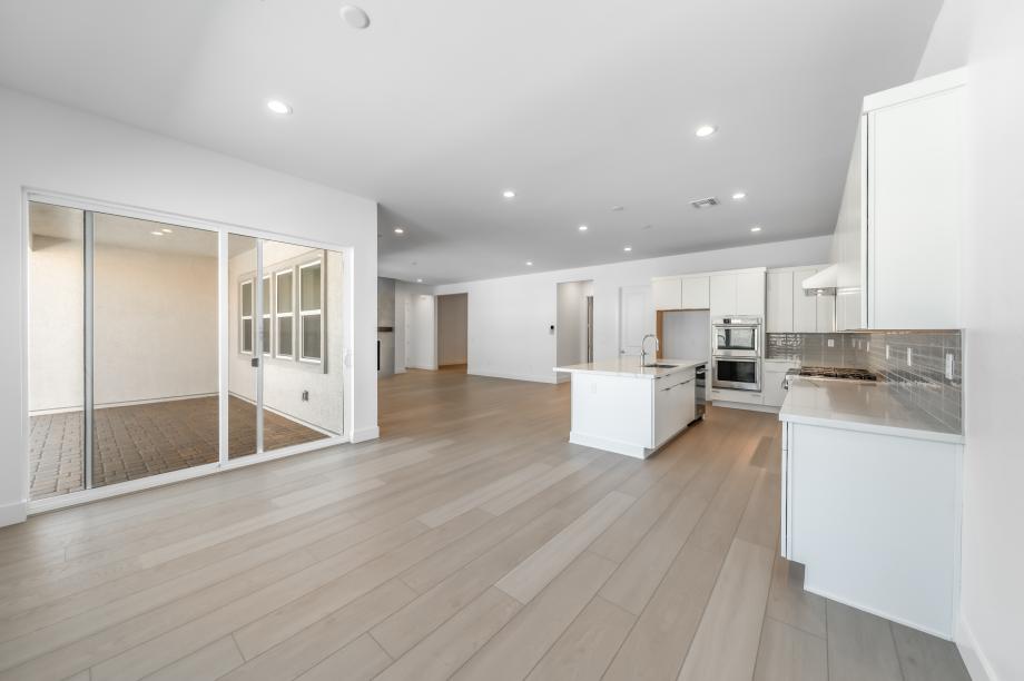 Casual dining area adjacent to kitchen and access to covered patio
