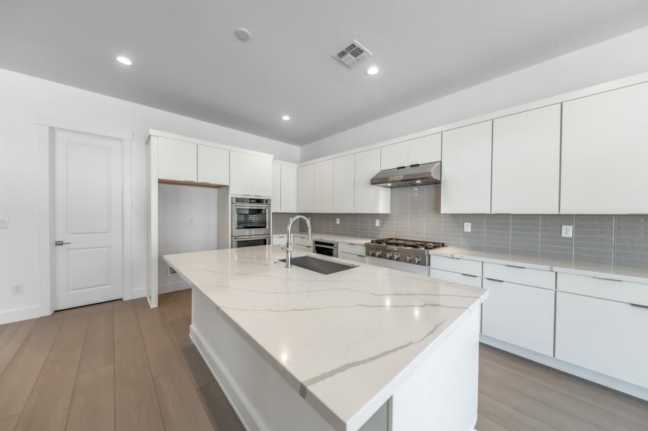 Well-equipped kitchen with beautiful cabinets and ample countertop space