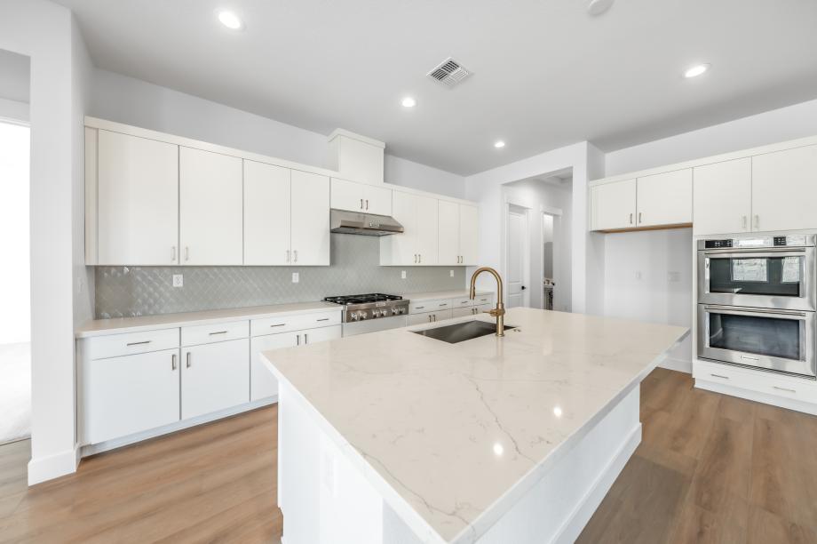 Well-equipped kitchen with beautiful cabinets and ample countertop space