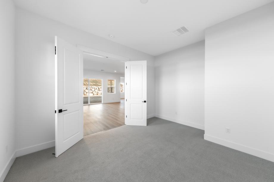 Versatile flex room located off the great room to suit your needs