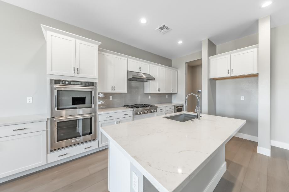 Well-equipped kitchen with beautiful cabinets and ample countertop space