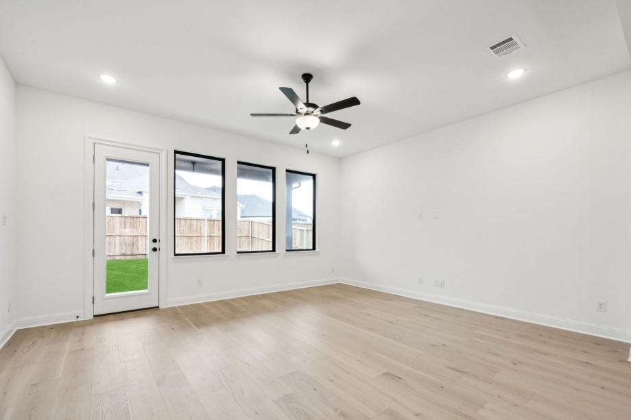 Spacious great room adjacent to the casual dining area and kitchen