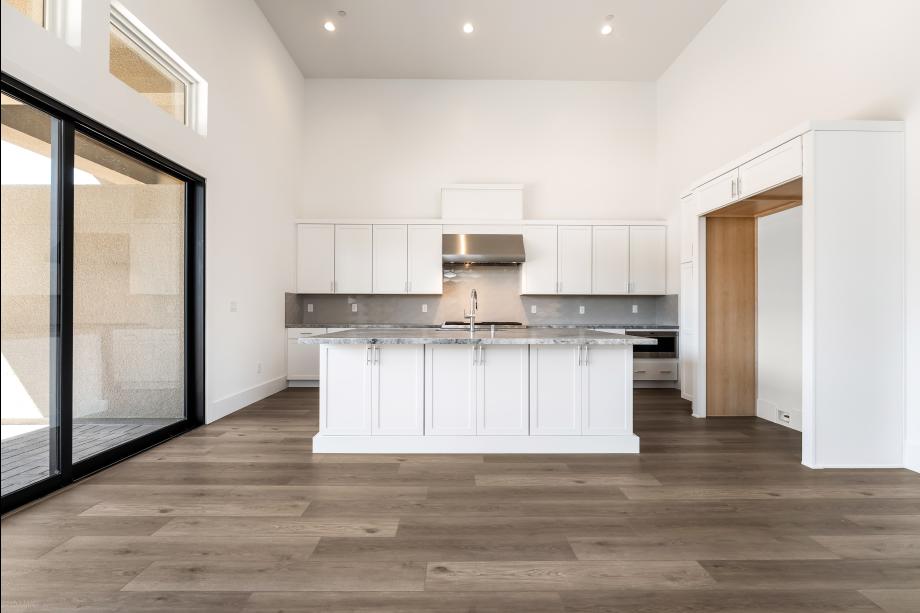 Beautifully upgraded kitchen with modern white cabinets