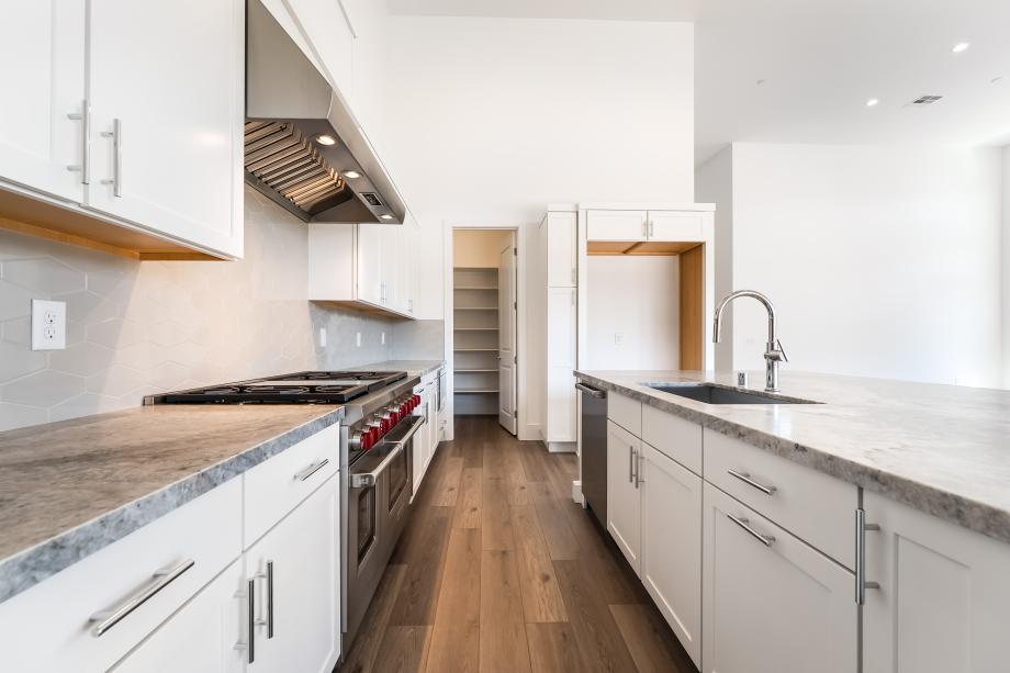Upgraded kitchen hard surface and tile backsplash
