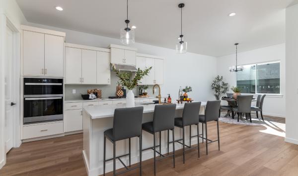 Gourmet kitchen includes a generous island and abundant cabinetry