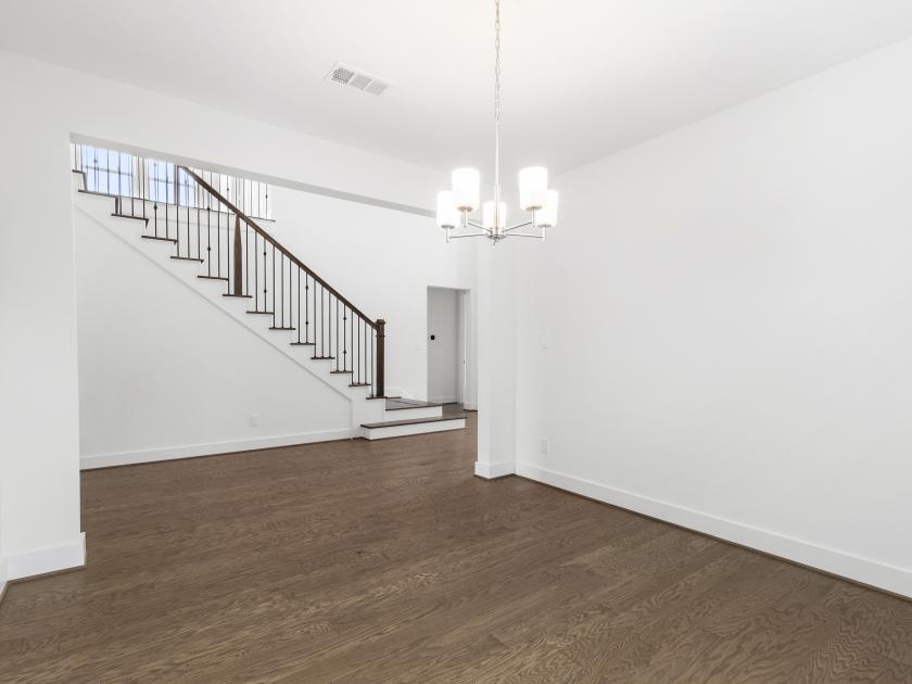 Dining area with updated light fixture