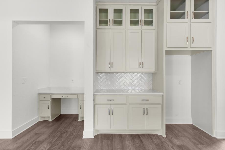 Dedicated workspace and beverage bar in the kitchen