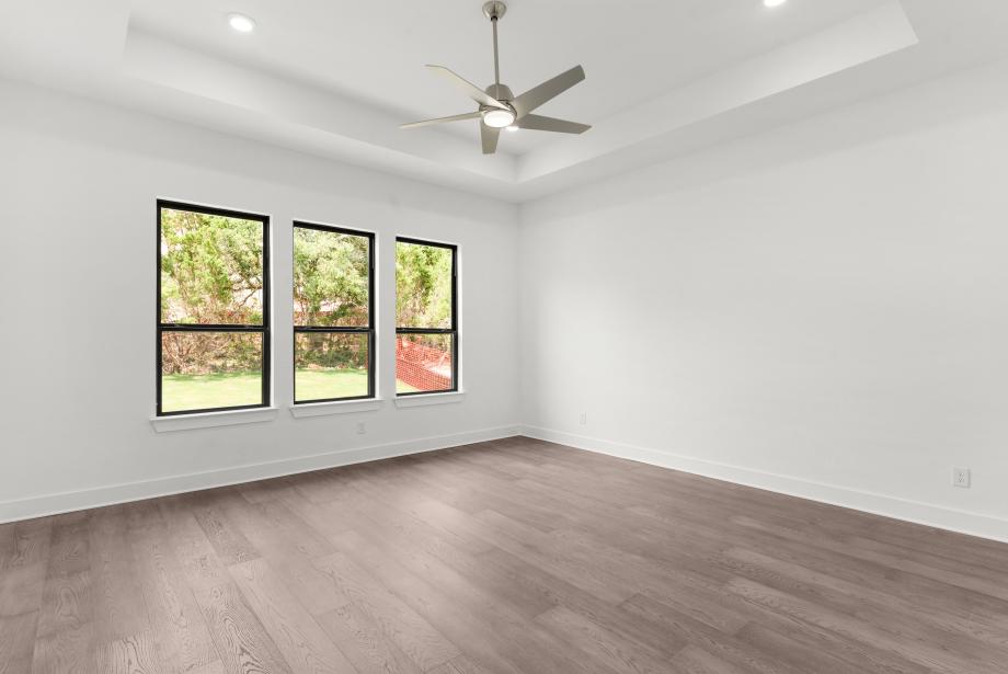 Luxurious primary bedroom suite