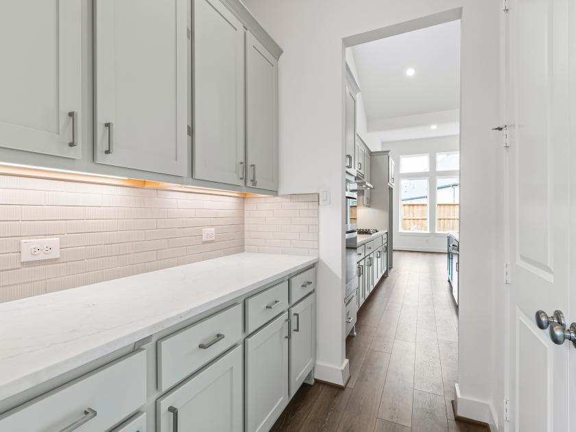 Butler pantry provides ample storage