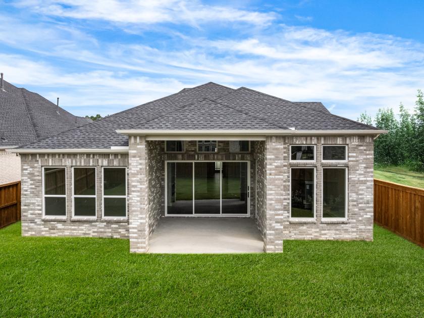 Expansive backyard with covered patio